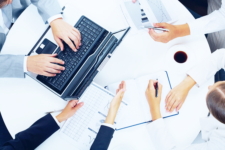 A team working together on a business and technology plan